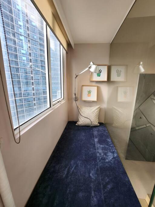 Apartment Enjoy Bgc Sunset And Golf Course View 2 Bedroom Loft With 100mbps Internet Connection